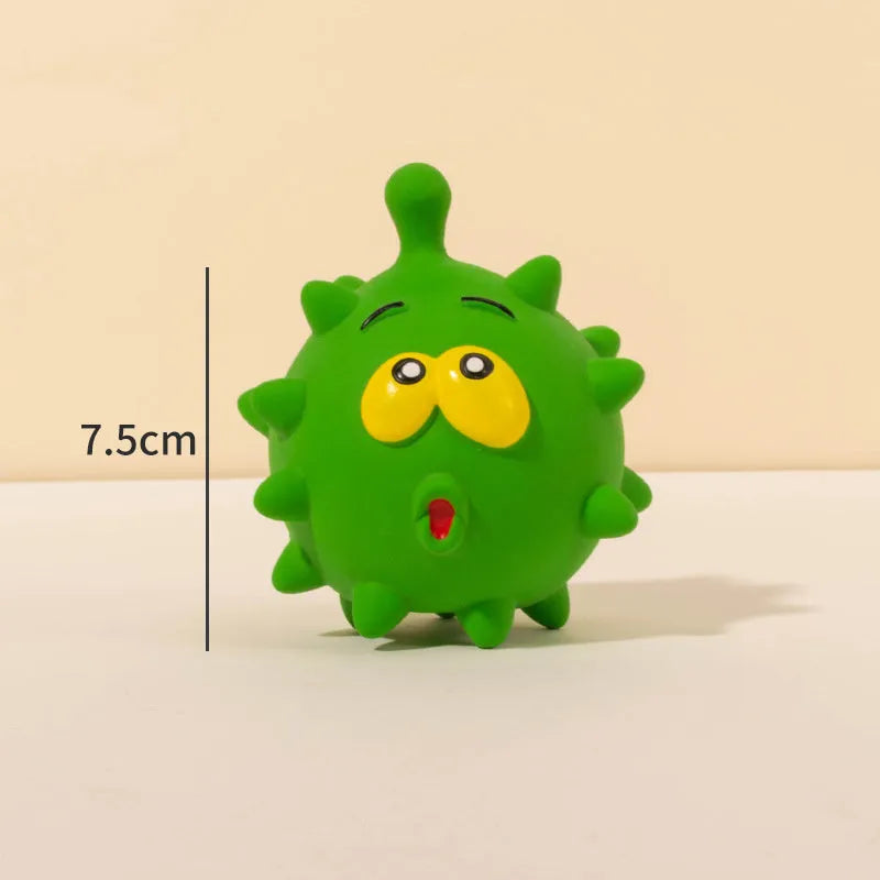 Four colourful natural latex dog balls with cute faces and textured surfaces
