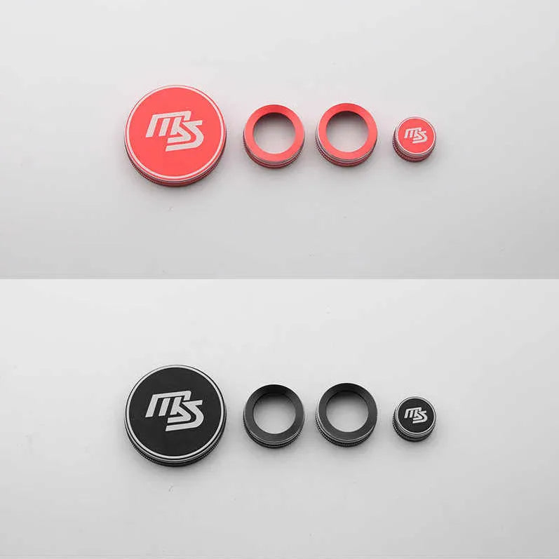 Red aluminium alloy decorative ring for car multimedia knob with MS logo on dashboard