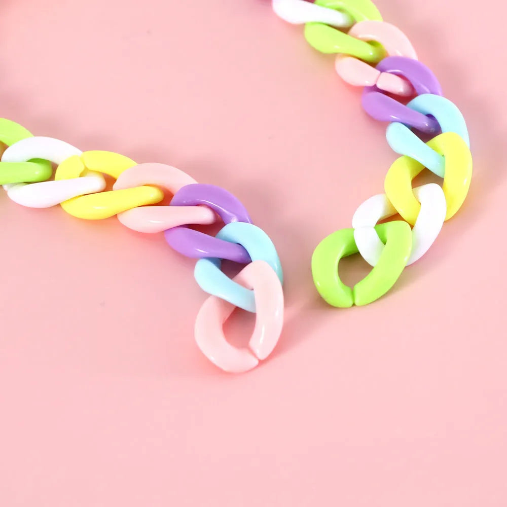 Adjustable plastic pet collar in macaron candy colours of blue, pink, and mixed chain for cats, dogs, or rabbits.