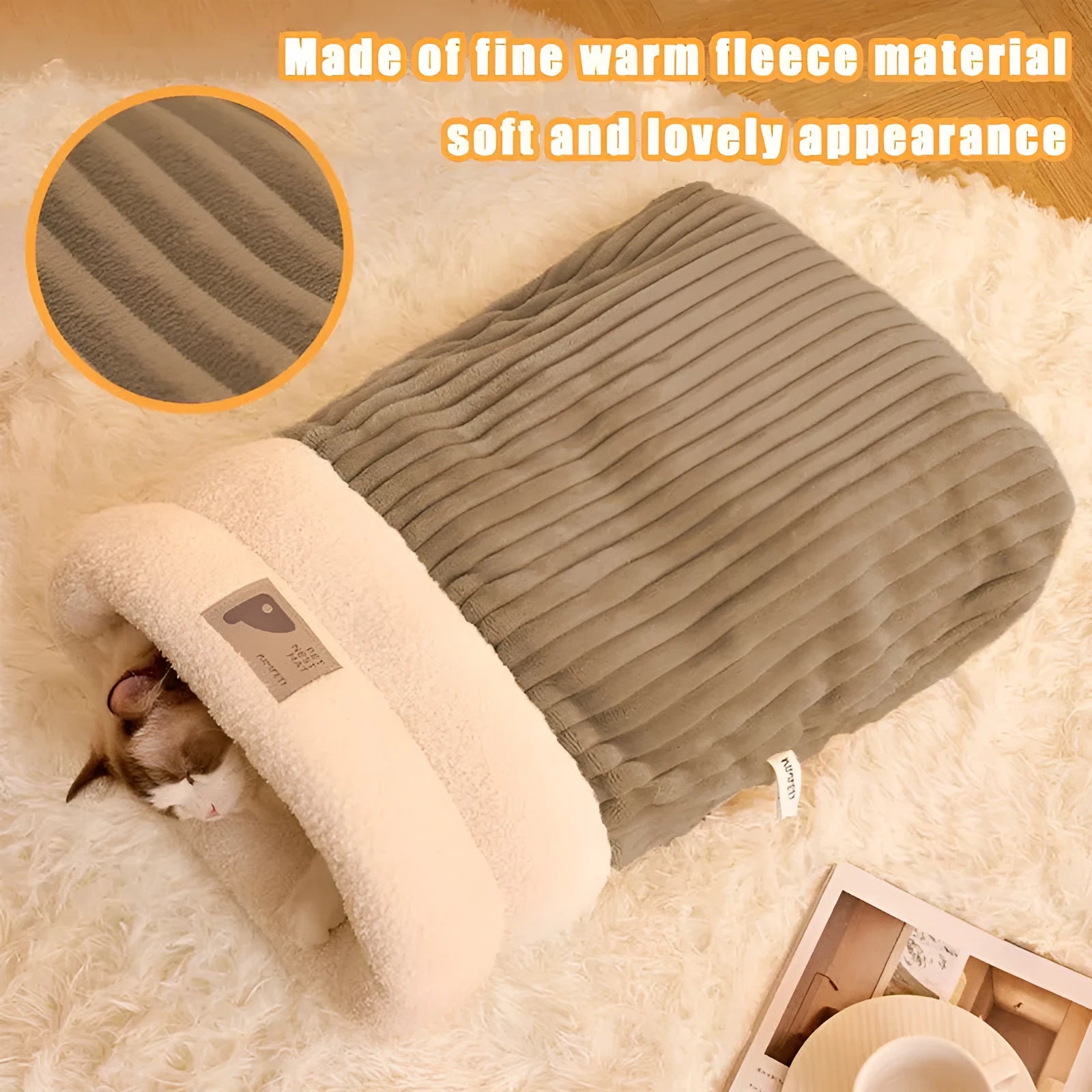 Brown semi-enclosed plush pet sleeping bag or cat nest bed on a wooden floor.