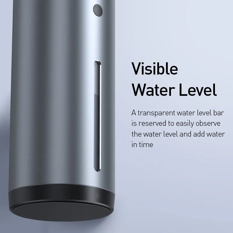 Black aluminium alloy car humidifier and air purifier with USB cable on a car dashboard.