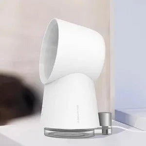 White desktop bladeless fan with USB humidification, 3 speed settings, and LED light on a desk