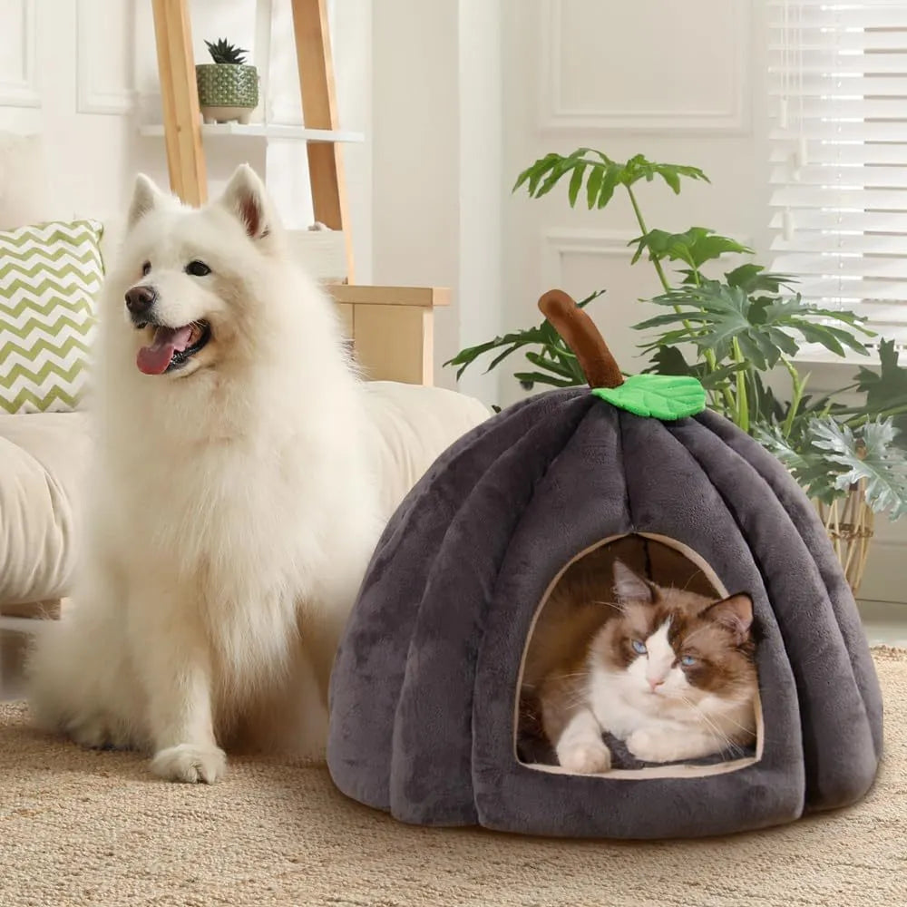 Pumpkin-shaped plush cat cave bed with a round entry hole, shown in blue colour