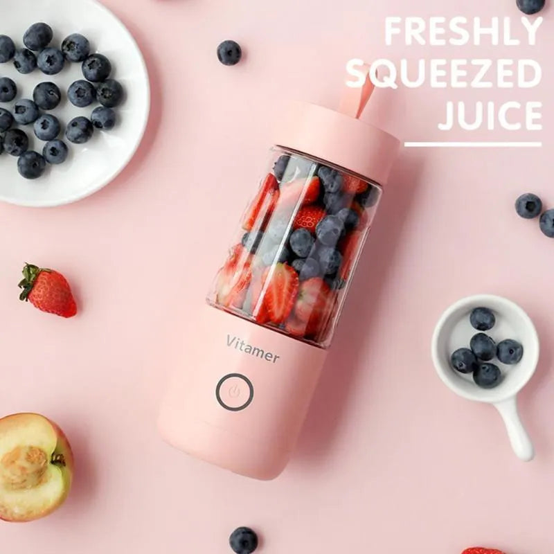 Dreamer Juice Cup portable blender in pink and white with 350ml capacity and stainless steel blade