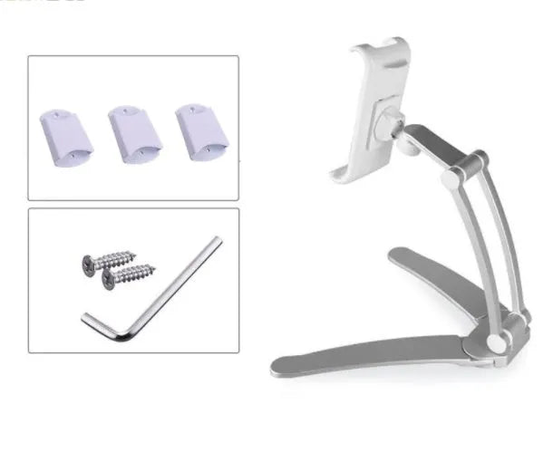 Silver aluminium desktop stand holding a tablet at an angle on a wooden desk.