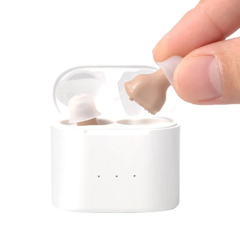 Invisible rechargeable noise reduction hearing aid in skin colour with within-ear fit