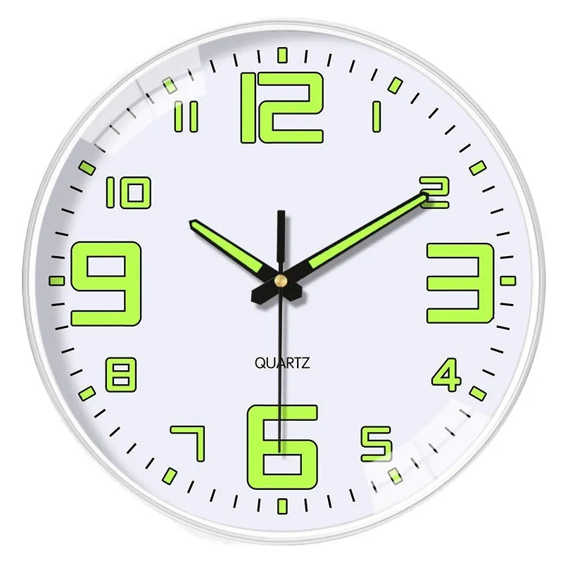 Modern 8-inch luminous wall clock with white face and black numbers on a wall.