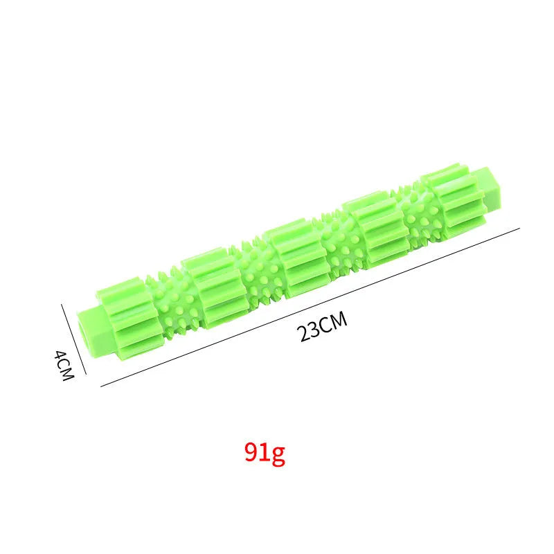 Green and orange rubber dog chew toy with treat dispensing compartment and squeaker for aggressive chewers