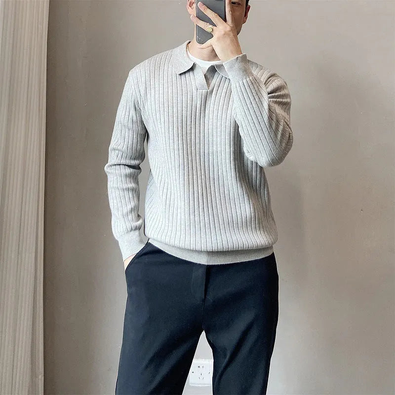 Man wearing a loose striped lapel knitted sweater in light grey, showing rabbit fur and modal blend fabric.