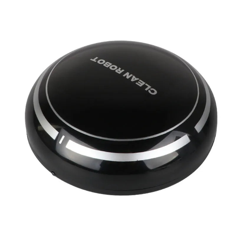 Mini desktop robot vacuum cleaner in white or black with dry dust box, flat nozzle and 4 metre power cord.