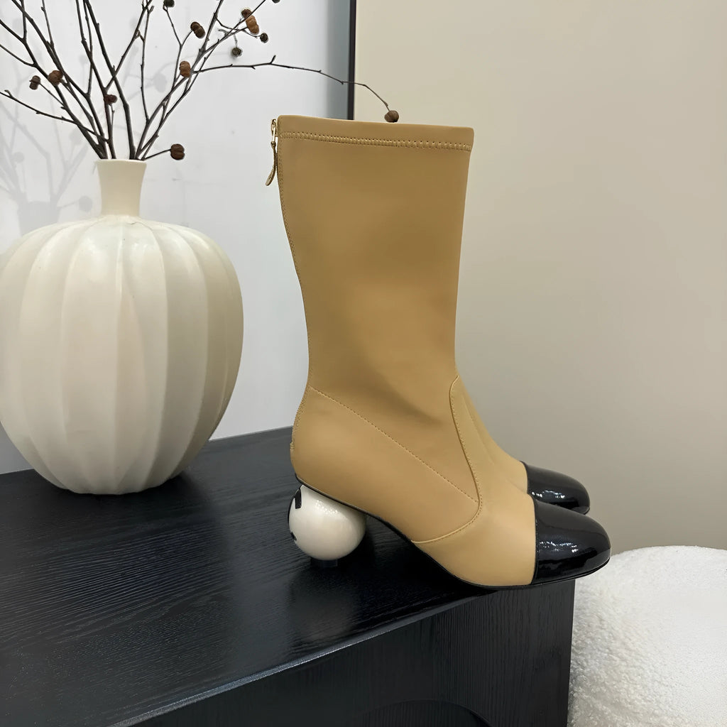 Women's chunky heel ankle boots with elastic fabric upper in black, white, and apricot side view