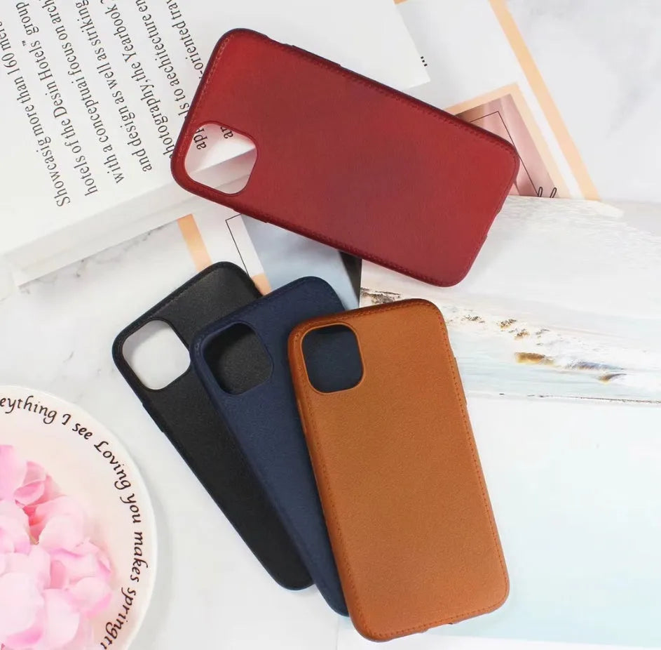Leather iPhone case with TPU protection in Black, Brown, Navy Blue, and Wine Red colours