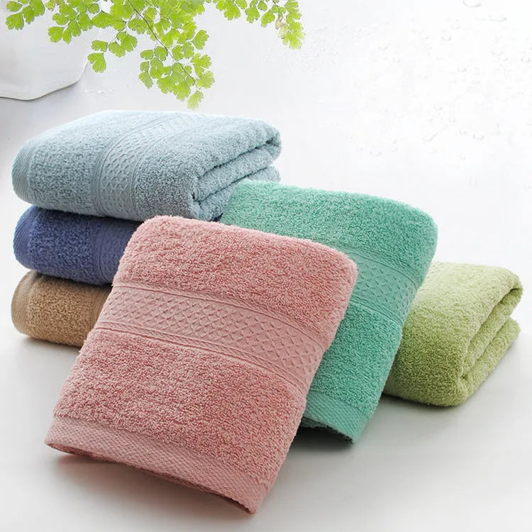 Thickened cotton blend bath and beach towel shown in one of its available colours like apple green or dark blue