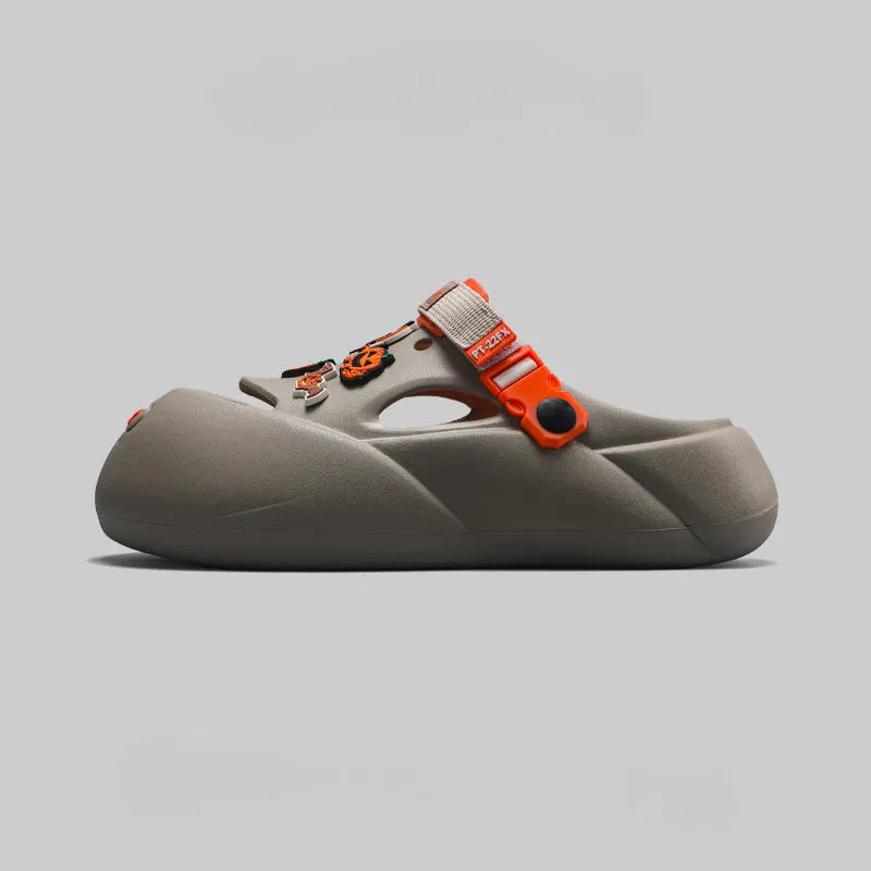 Men's grey baotou beach shoes with a soft EVA sole, shown on a sandy background.