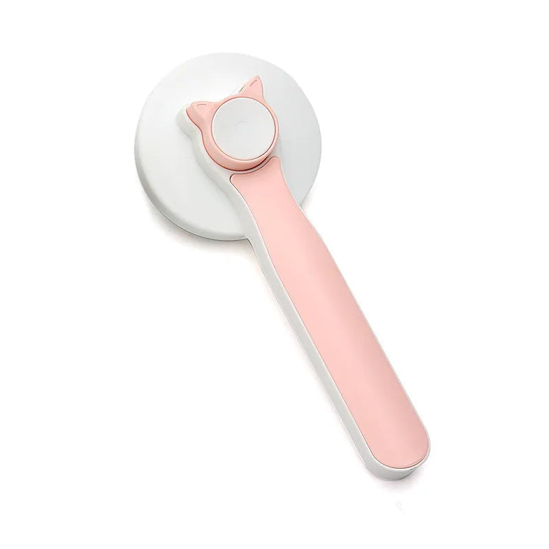 Blue grey pink self-cleaning pet grooming brush with ergonomic rubber handle.