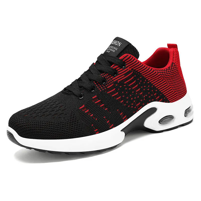 Men's low-top black and gray Flyknit mesh casual sneakers with lace-up front and round toe.