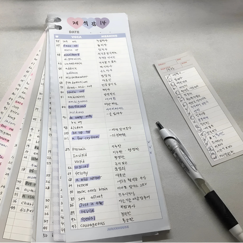 Vertical half-B5 notepad with printed lines for English words, in blue cover.