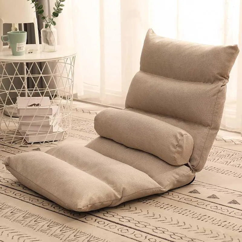 Beige lazy sofa floor chair with adjustable backrest on living room floor showing six-angle mechanism