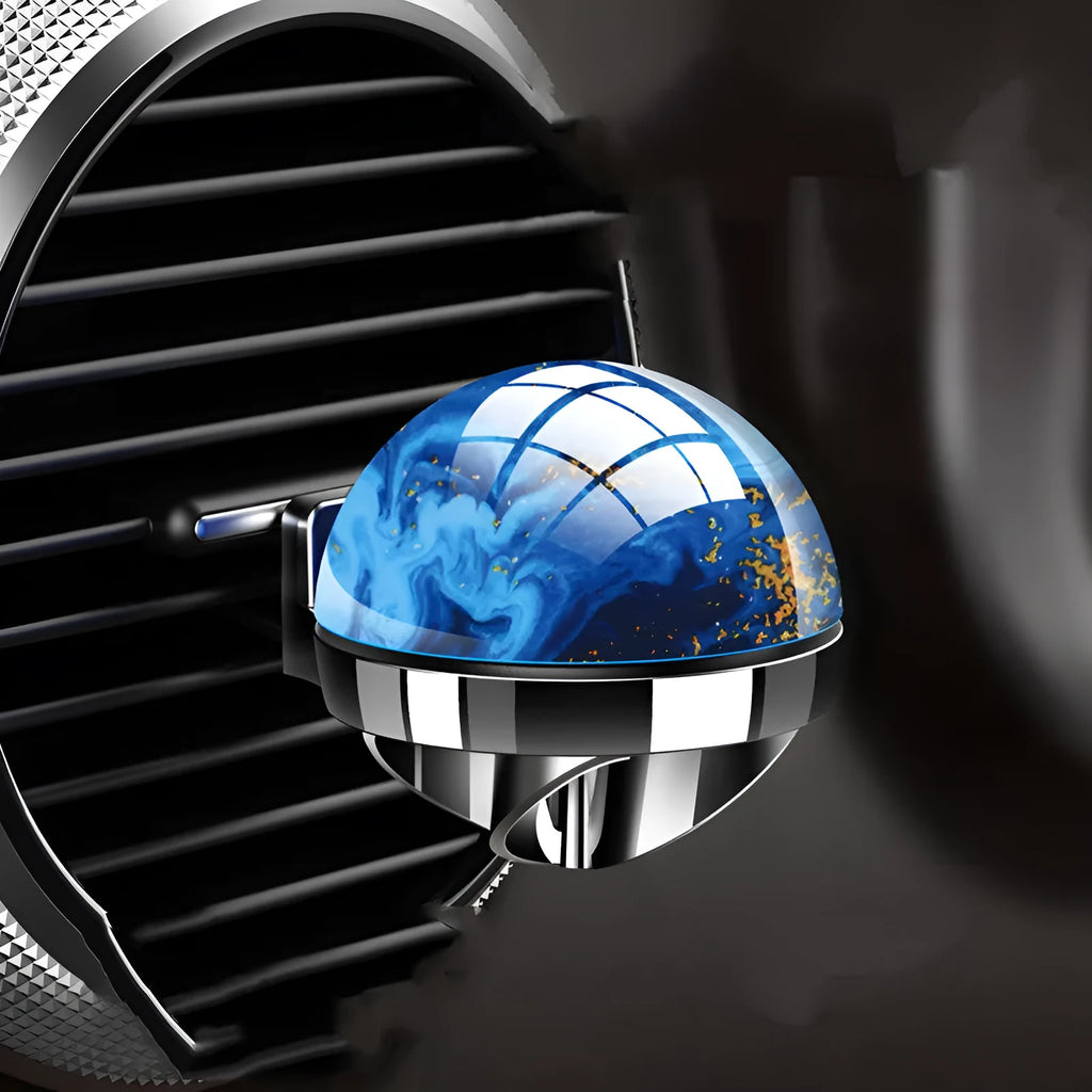 Planet-shaped car aromatherapy diffuser in gun black finish with ABS vacuum plating and two fragrance oil bottles