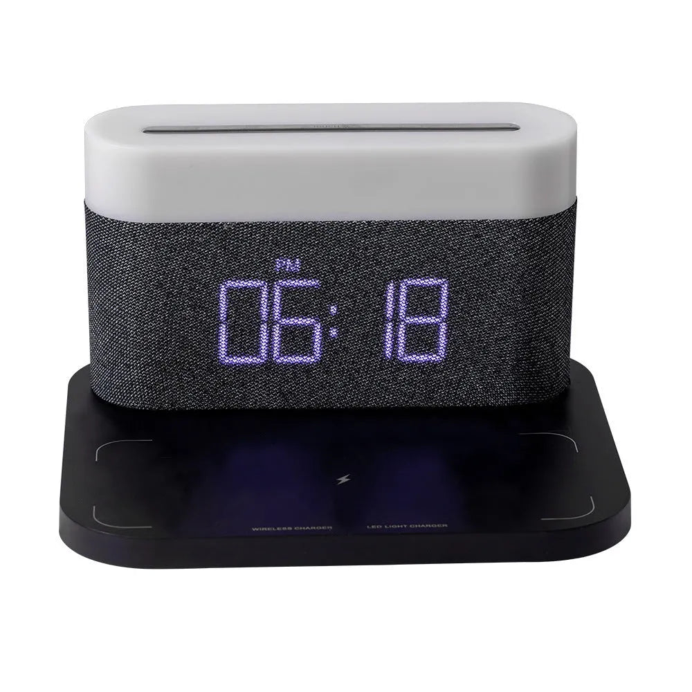White wireless charging bedside lamp with digital alarm clock display on nightstand