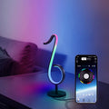 Black aluminium and iron intelligent APP remote control symphony atmosphere light with 180° rotation on a desktop