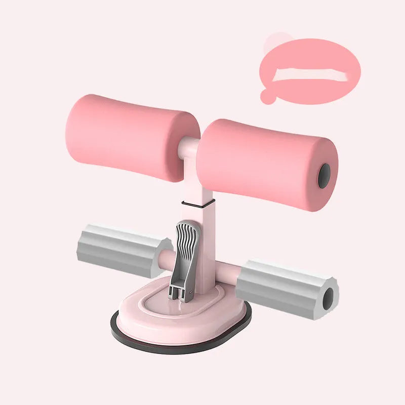 Pink adjustable sit-up bar floor assistant, 27x21cm, with foam padding and suction base