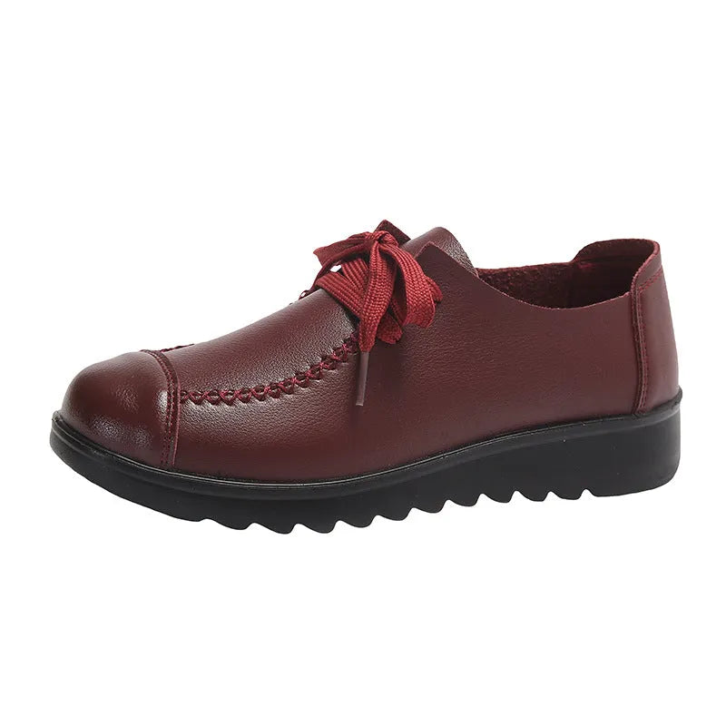 Women's work shoes in colour 6018 Black with round toe, front lacing, and anti-slip sole