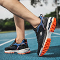 Junior high school running shoes with non-slip rubber sole and mesh upper, side view, in Black Grey colour