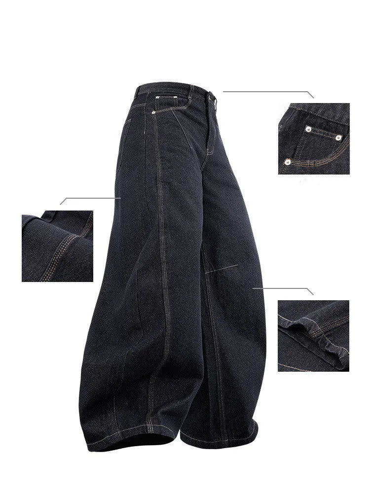Men's wide leg denim trousers in original cow colour showing relaxed fit and mid waist design.