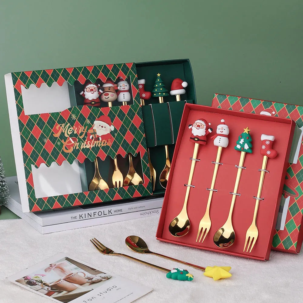 Stainless steel Christmas spoon and fork set with snowman and tree designs on handles