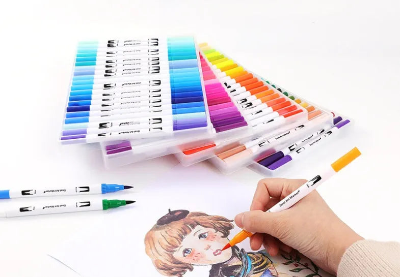 Set of ink water colour pens in a case, showing multiple colour barrels for artistic use.