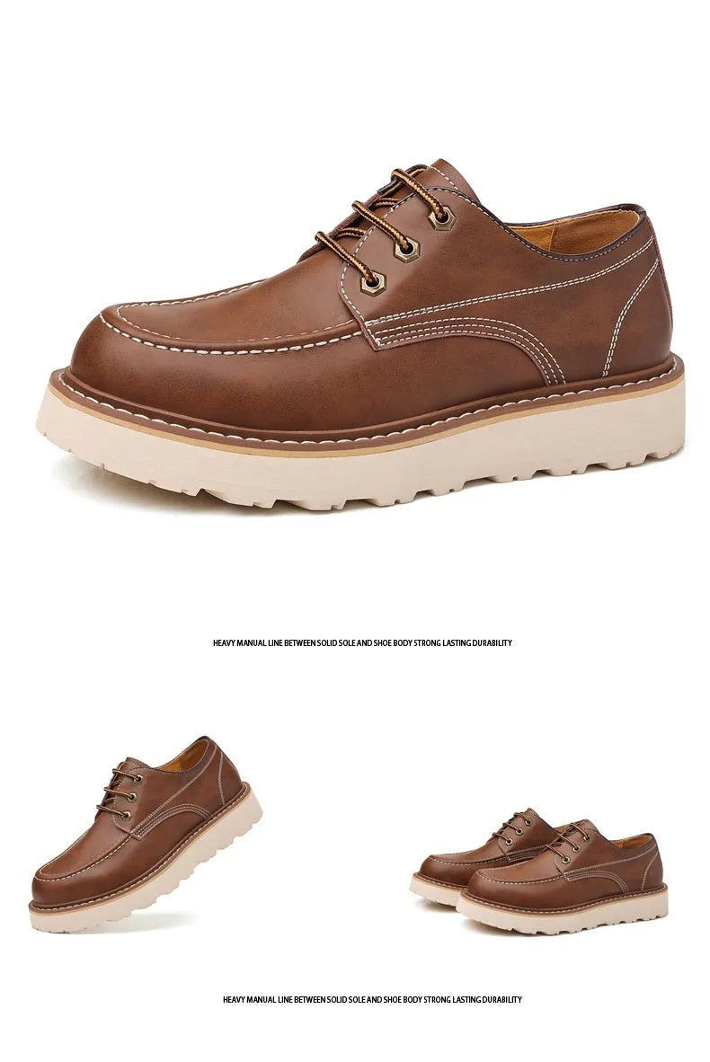 Men's black low-top Martin boots with a round toe and rubber sole on a plain background.