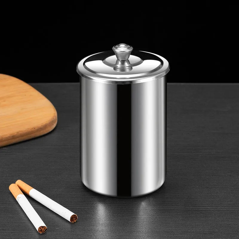 Stainless steel fly ash ashtray with a removable cover, funnel, and smoke button.