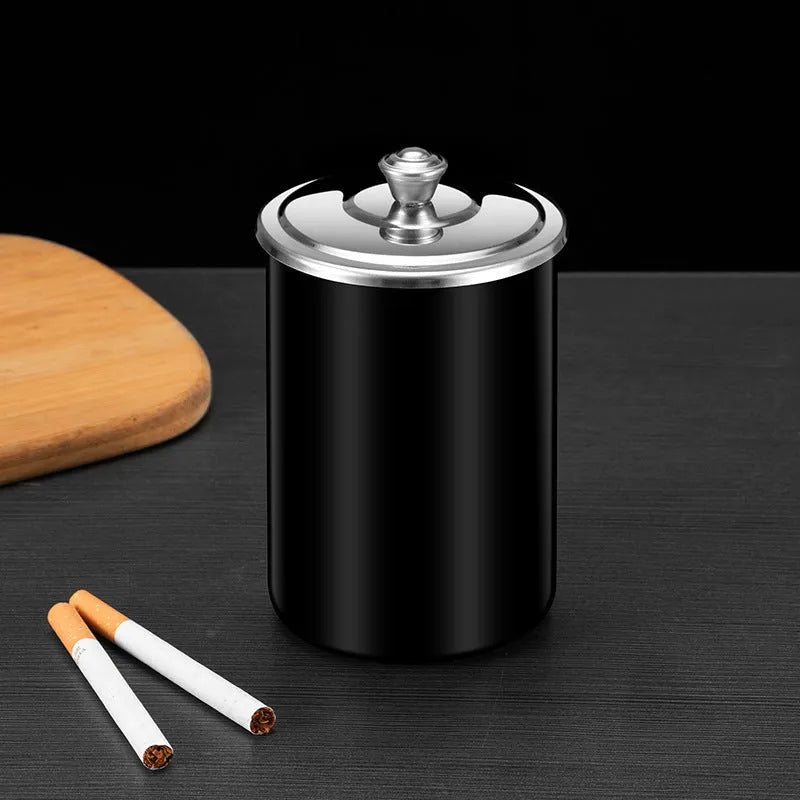 Stainless steel fly ash ashtray with a removable cover, funnel, and smoke button.