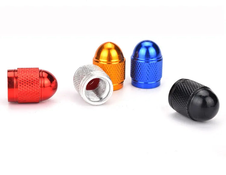 Aluminium mountain bike air valve cap in assorted colours: black, blue, gold, silver, red.