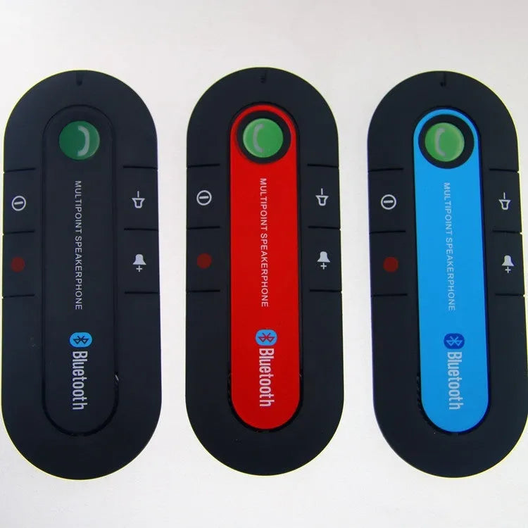 Black vehicle-mounted Bluetooth handsfree and music player device attached to a car sun visor.