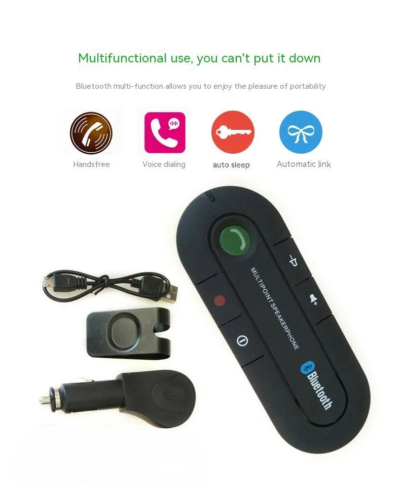 Black vehicle-mounted Bluetooth handsfree and music player device attached to a car sun visor.