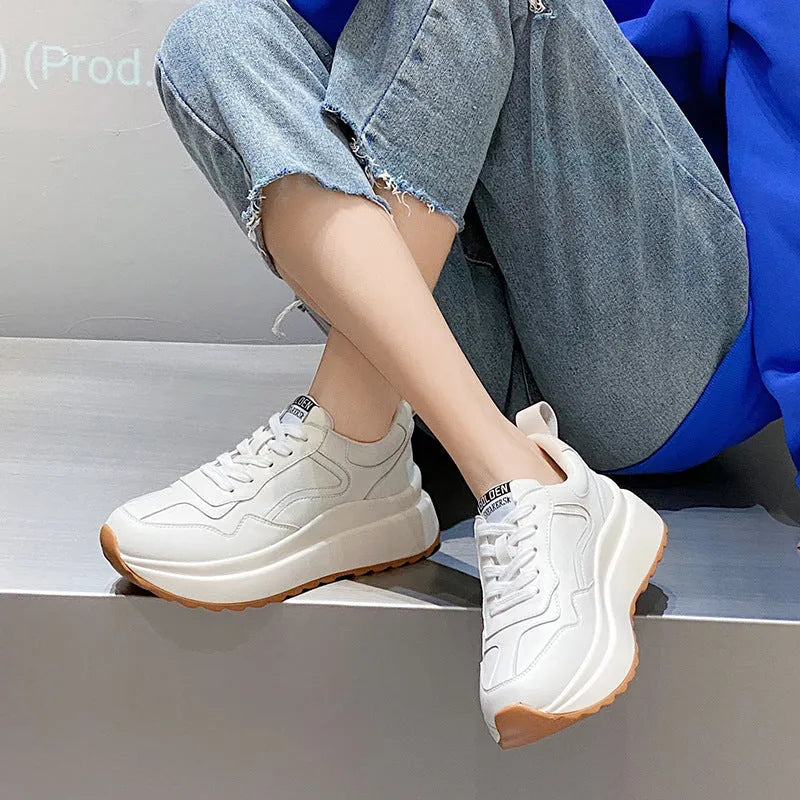 Women's beige cattlehide leather casual sports shoes with cross strap detail and low-top design
