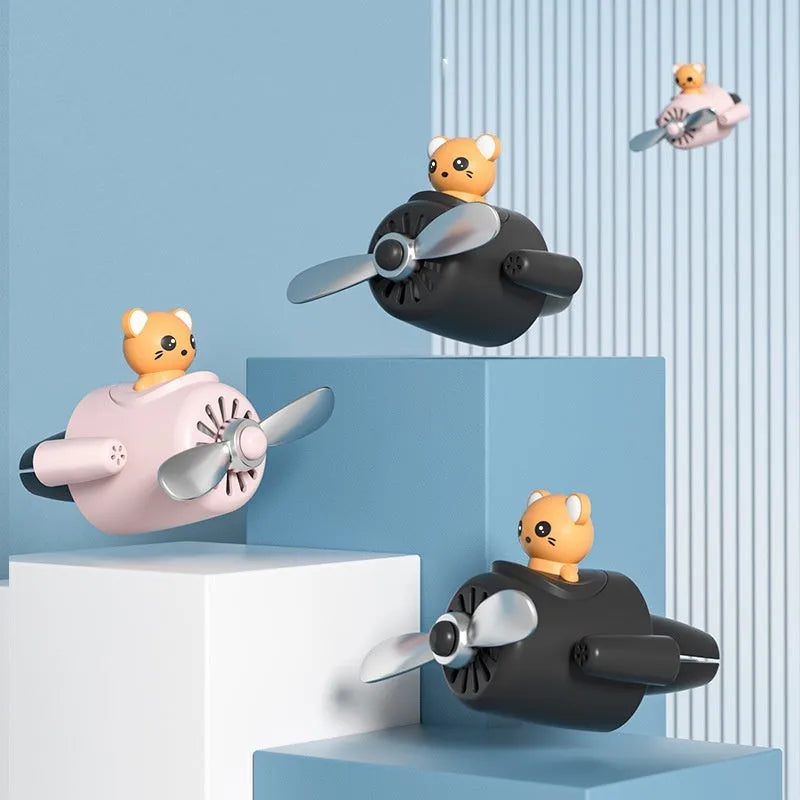 Cartoon aeroplane shaped plastic car vent clip aromatherapy accessory in four colour options