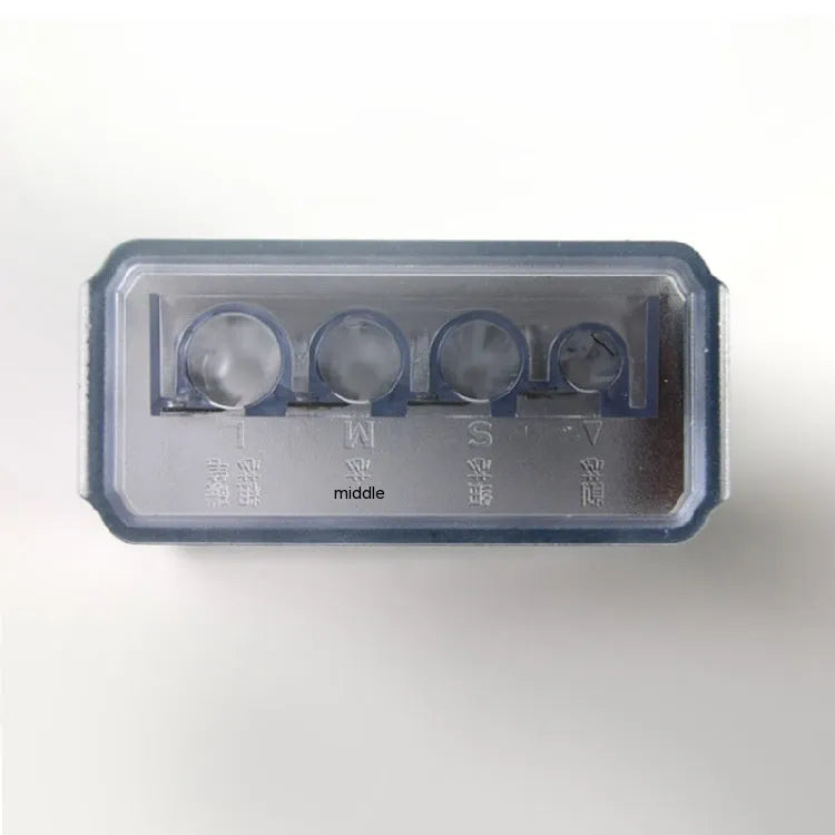 Geometric plastic pencil sharpener with four holes, shown with blades and a screwdriver.