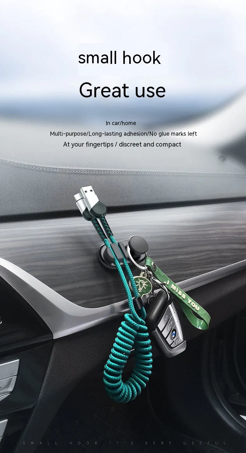 Dark green ABS silicone car cable storage hook measuring 52mm for organising charging cables