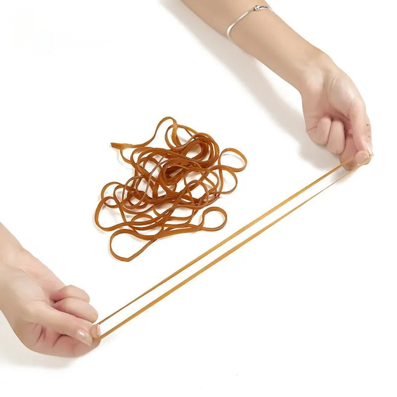 Circular natural rubber elastic bands shown in a 500g bag quantity