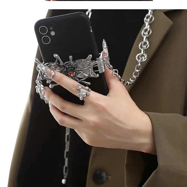 Spider moonstone alloy phone charm with electroplated silver finish and insect pattern pendant on chain.