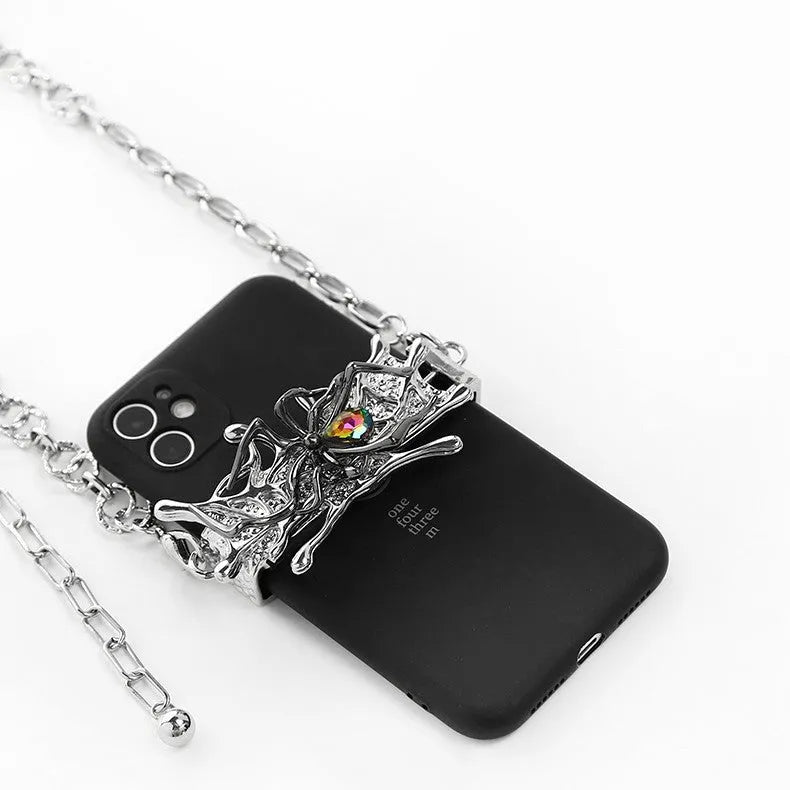 Spider moonstone alloy phone charm with electroplated silver finish and insect pattern pendant on chain.