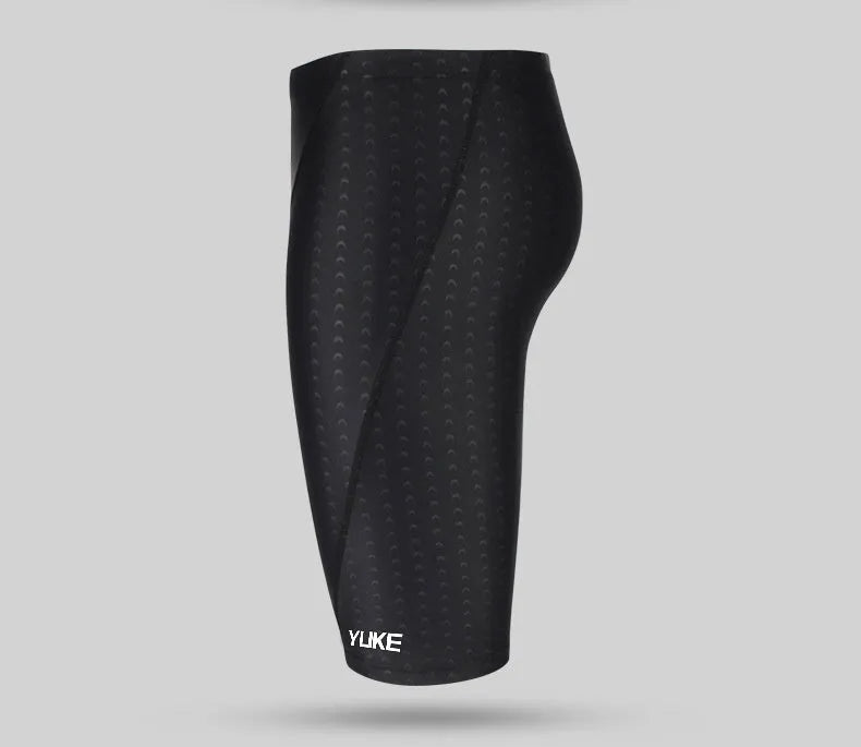 Men's black 5-piece swimming set showing swimming trunks, goggles, cap, ear plugs with nose clip, and carrying bag