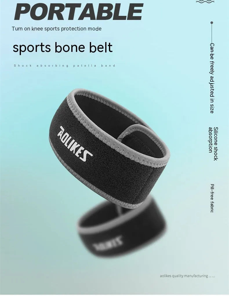 Black and grey patella retinaculum knee support for running and sports.