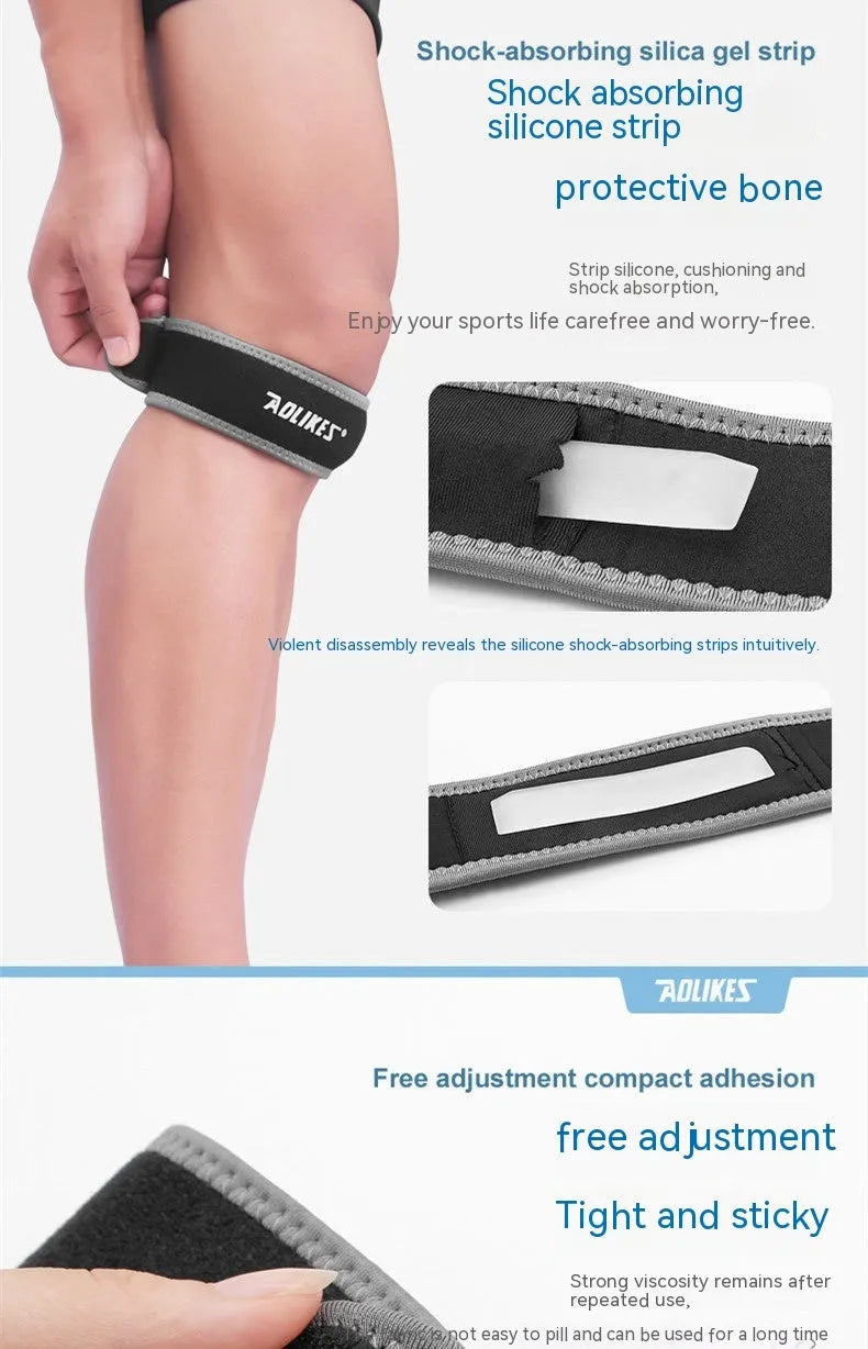 Black and grey patella retinaculum knee support for running and sports.