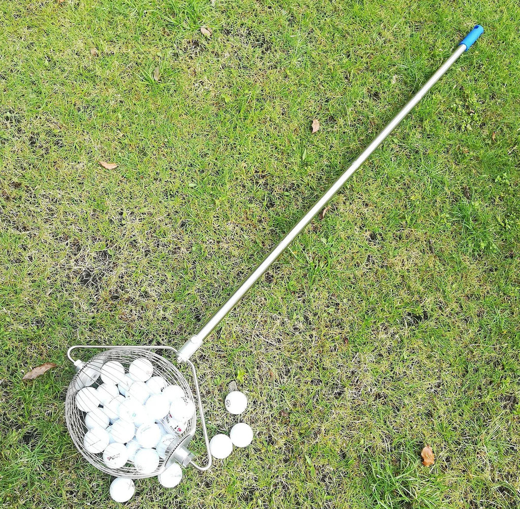 A metallic-coloured stainless steel golf ball picker or retriever tool on a green background.