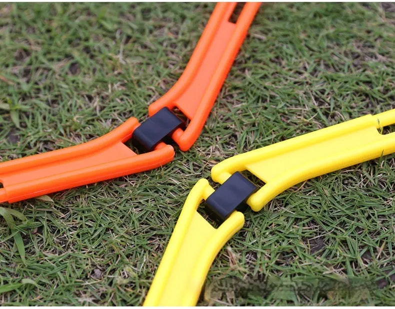 Set of six foldable hexagonal football agility training rings in yellow, green, and orange colours.