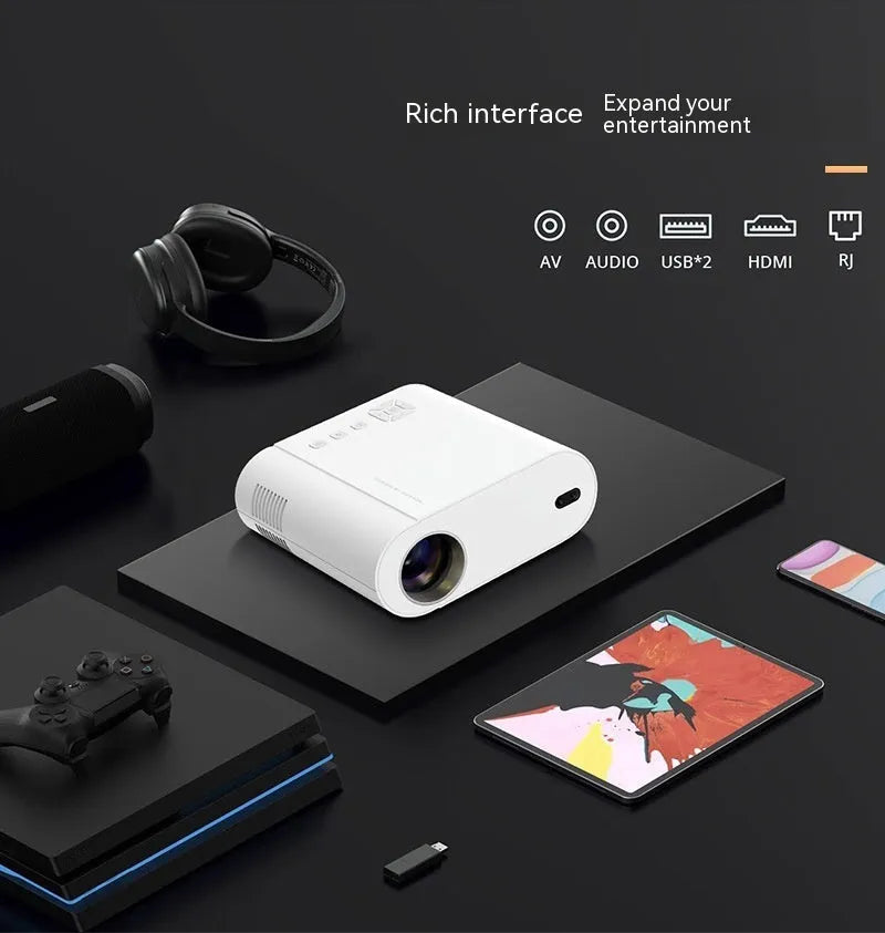 White Full HD smart Android projector with remote control on a table.